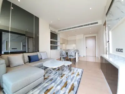 Luxurious modern living room with open kitchen and stylish decor