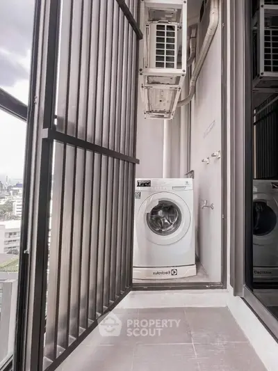 Modern apartment balcony with washing machine and city view