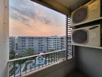 Modern apartment balcony with air conditioning units and scenic view