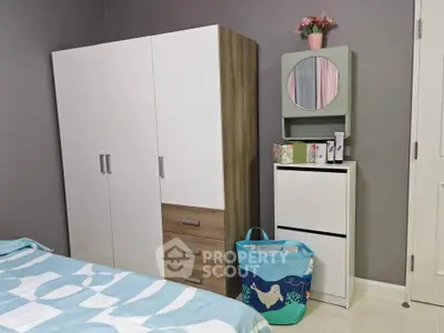 Cozy bedroom with modern wardrobe and stylish decor