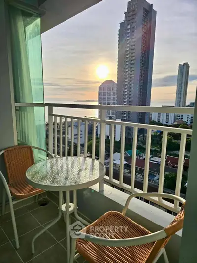Charming balcony with stunning city and ocean view, perfect for relaxing and enjoying sunsets.