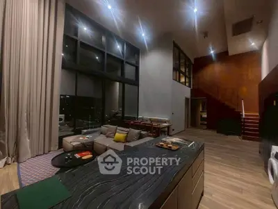 Luxurious modern living room with high ceilings and stylish decor