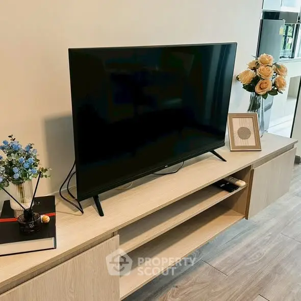 Modern living room with sleek TV setup and elegant decor