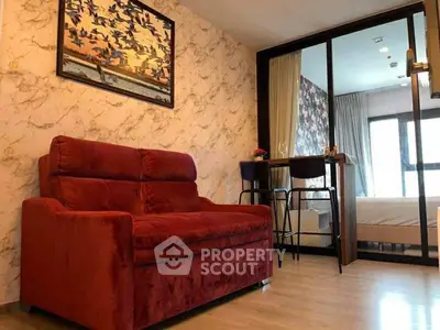 Stylish living room with red sofa and modern decor in a cozy apartment