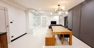 Modern living room with sleek design, spacious layout, and stylish lighting, perfect for contemporary living.