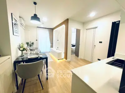 Modern open-plan living room with stylish decor and dining area