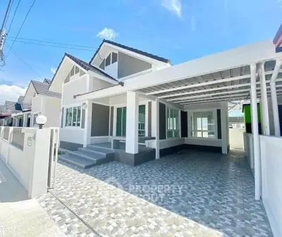 Modern single-family home with spacious driveway and contemporary design