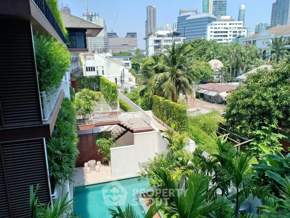 Luxurious urban oasis with pool and lush greenery in a vibrant cityscape.