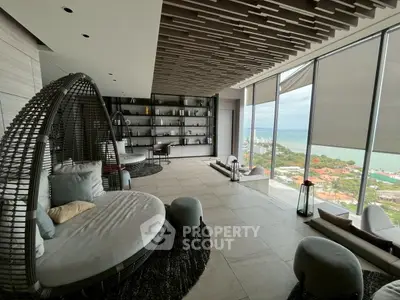 Luxurious living room with panoramic ocean view and modern decor