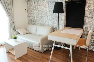 Modern living room with stylish wallpaper and cozy furniture