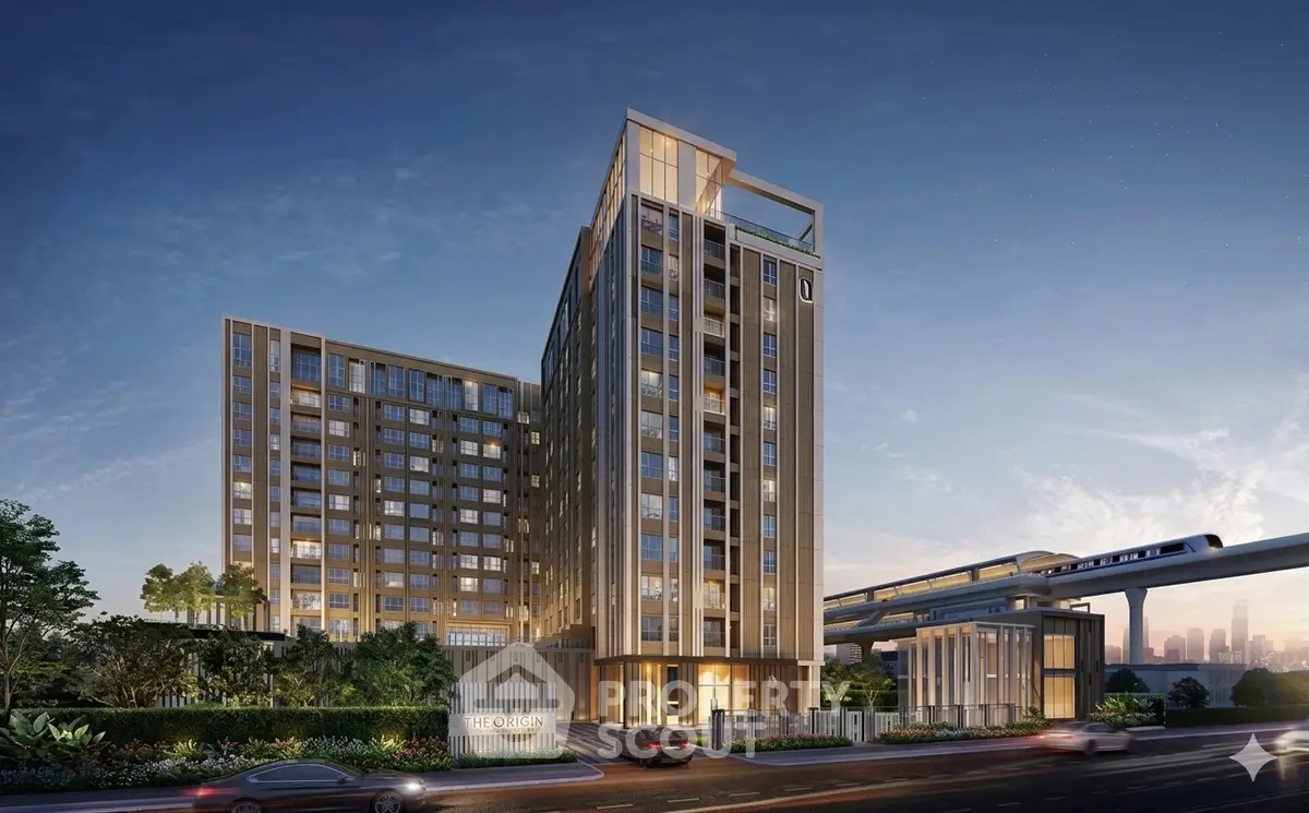 Modern high-rise building with sleek design and lush landscaping, ideal for urban living.