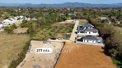 Expansive land plot with development potential in scenic countryside setting