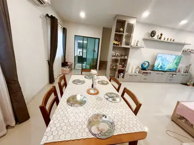 Spacious living room with elegant dining area and modern decor