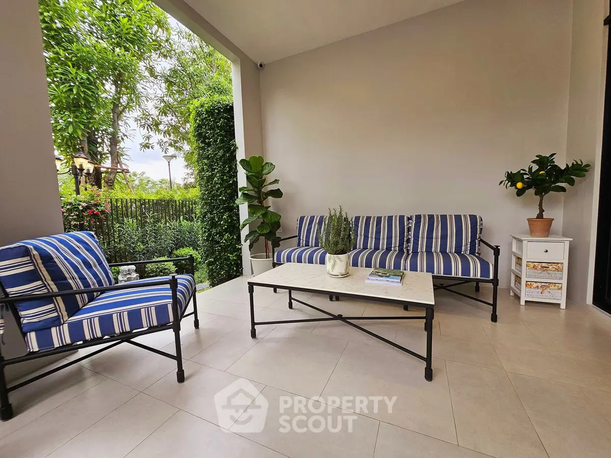 Charming garden patio with stylish outdoor furniture and lush greenery