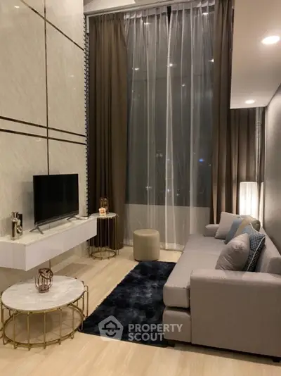 Luxurious modern living room with high ceilings and elegant decor