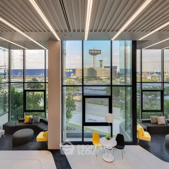 Modern interior with large windows and IKEA view, stylish seating area.