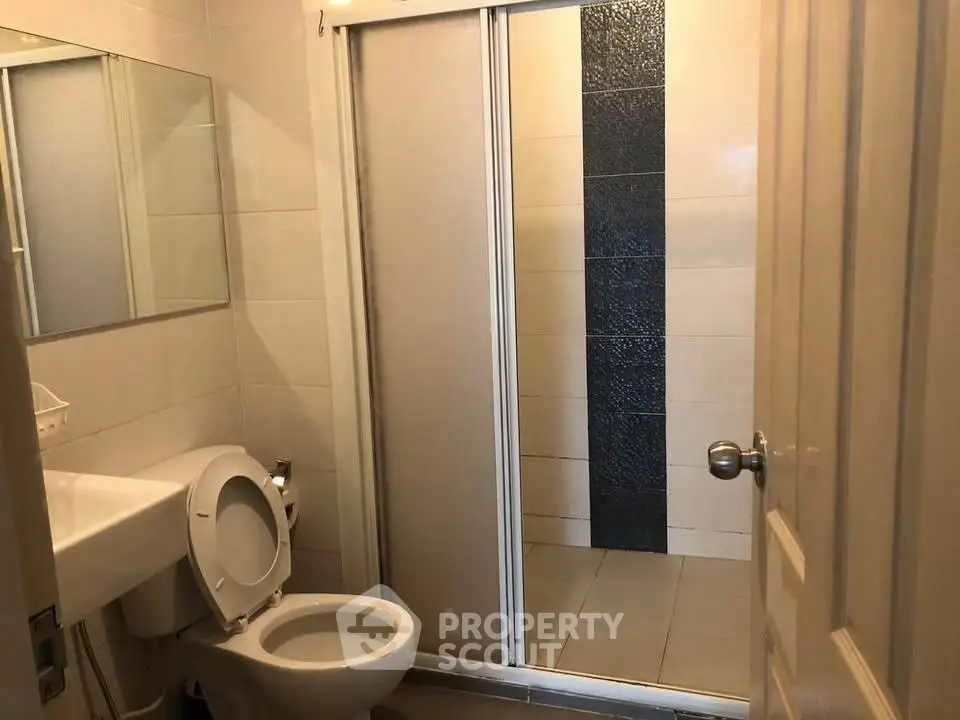Modern bathroom with shower and sleek design