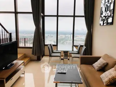 Luxurious living room with panoramic city view and modern decor