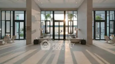 Luxurious modern living room with floor-to-ceiling windows and elegant decor.