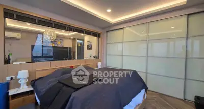 Luxurious modern bedroom with sleek design and ample natural light