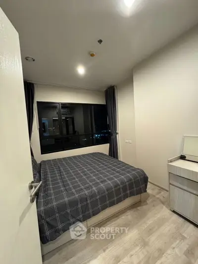 Modern bedroom with sleek design and cozy ambiance