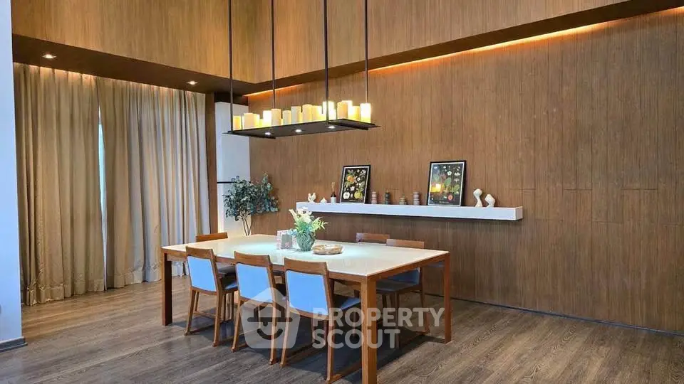 Elegant dining room with modern wooden decor and ambient lighting