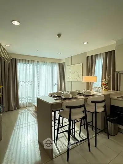 Modern kitchen with open layout and stylish dining area