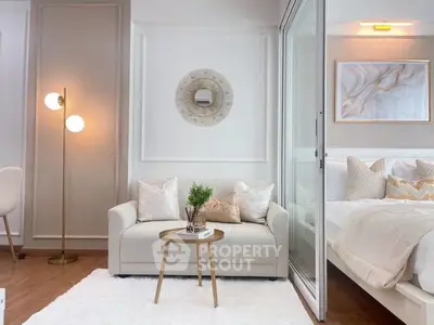 Elegant modern living room with cozy sofa and stylish decor