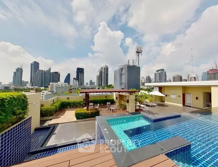 Stunning rooftop pool with city skyline views, perfect for urban living.