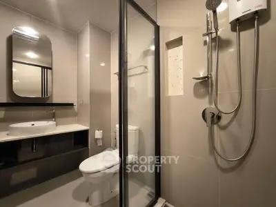 Modern bathroom with sleek shower enclosure and stylish fixtures