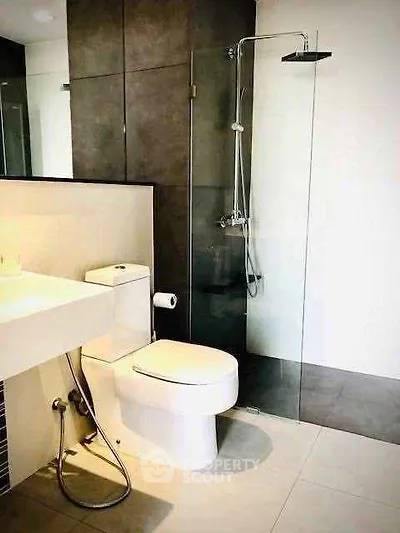 Modern bathroom with sleek shower and contemporary fixtures