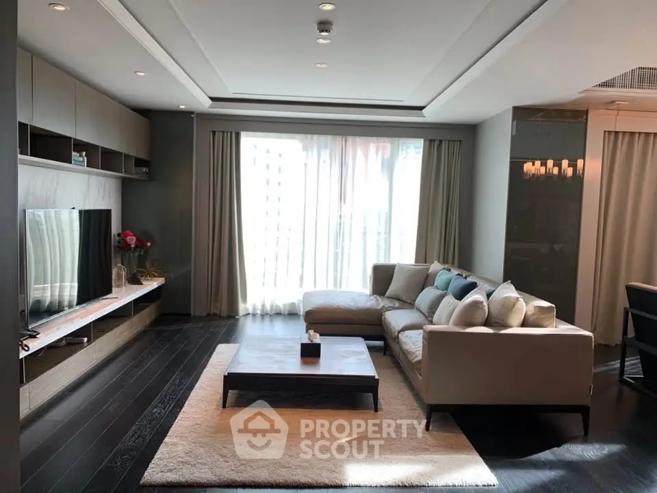 Luxurious modern living room with elegant decor and ample natural light