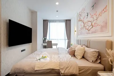 Luxurious bedroom with elegant decor and large window for natural light