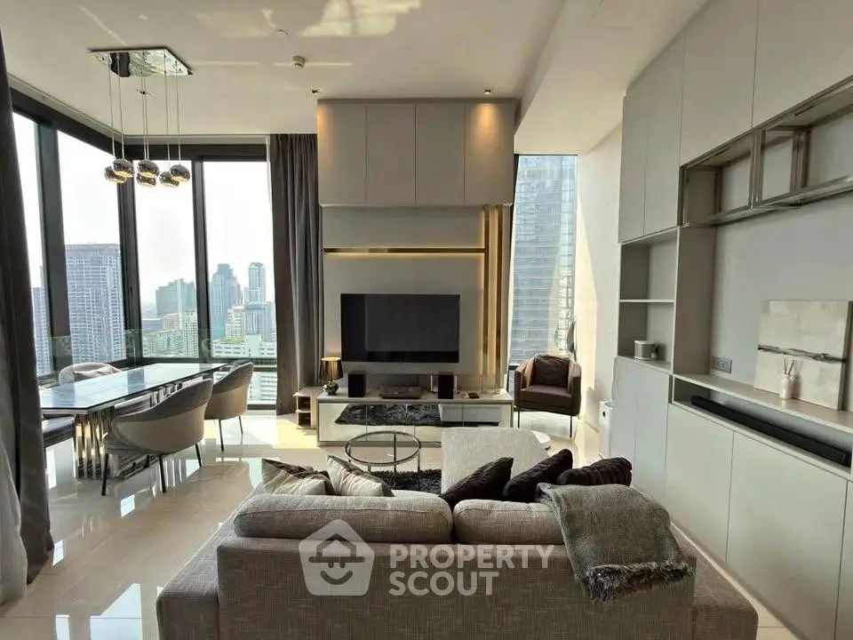 Luxurious modern living room with panoramic city views and elegant dining area.