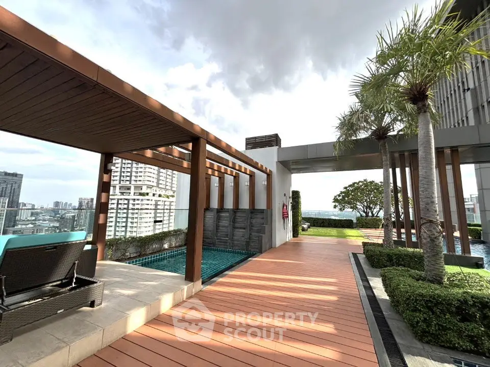 Luxurious rooftop pool area with stunning city views and modern design elements.