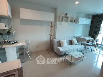 Modern living room with sleek furniture and open layout, perfect for urban living.