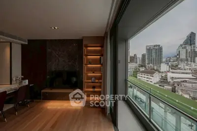 Modern living room with city view and elegant wooden flooring