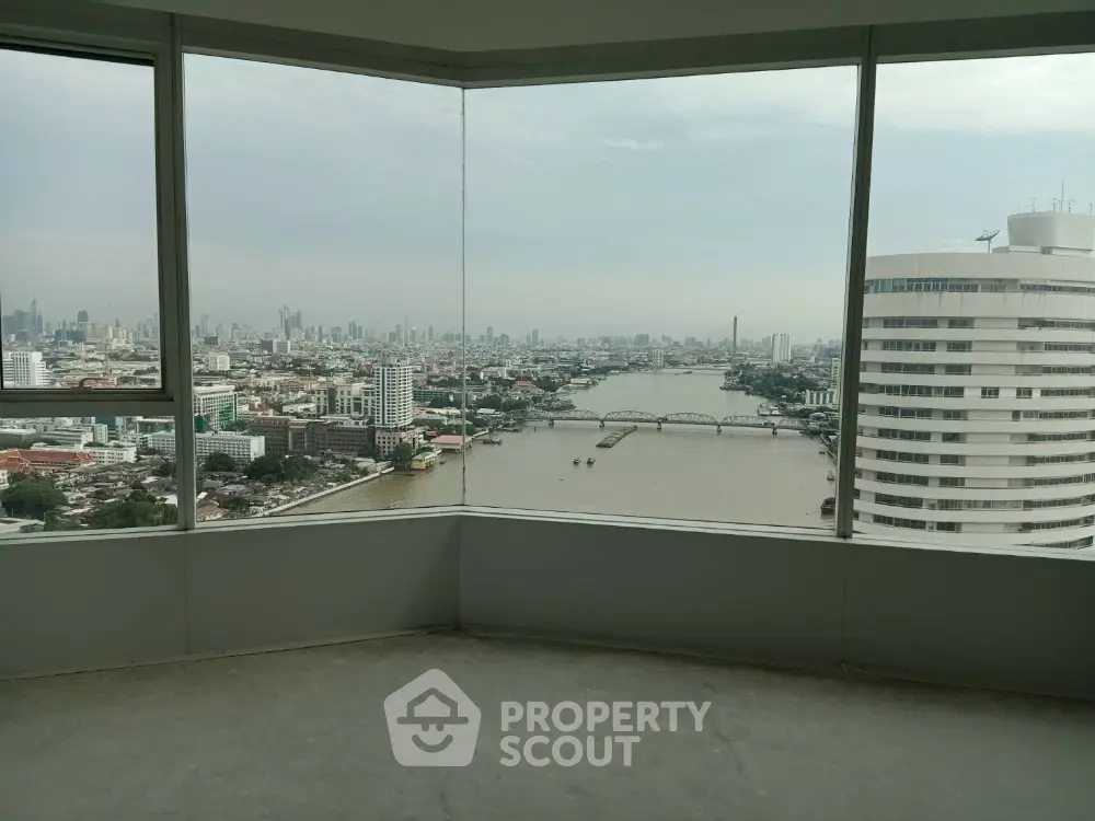 Stunning river and cityscape view from high-rise apartment corner unit.