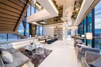 Luxurious modern living room with panoramic city views and elegant decor