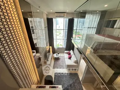 Luxurious modern loft with floor-to-ceiling windows and stylish decor