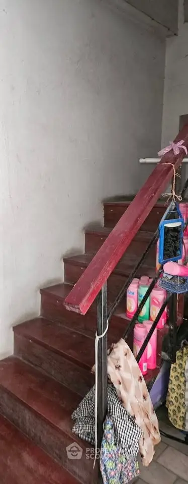 Charming staircase with wooden steps and decorative items, perfect for a cozy home ambiance.