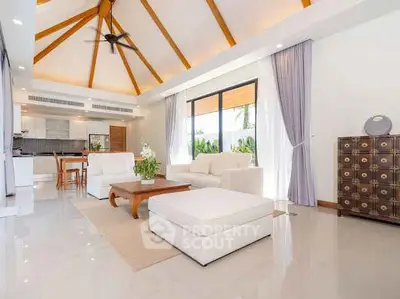 Spacious modern living room with high ceilings and elegant decor
