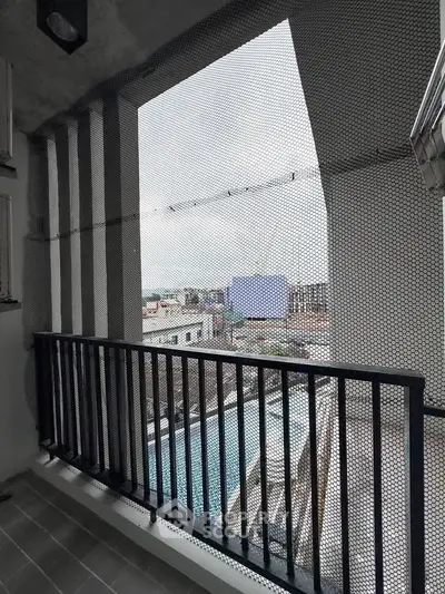 Modern balcony with city view and sleek railing design