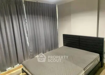 Cozy bedroom with modern design and ample natural light