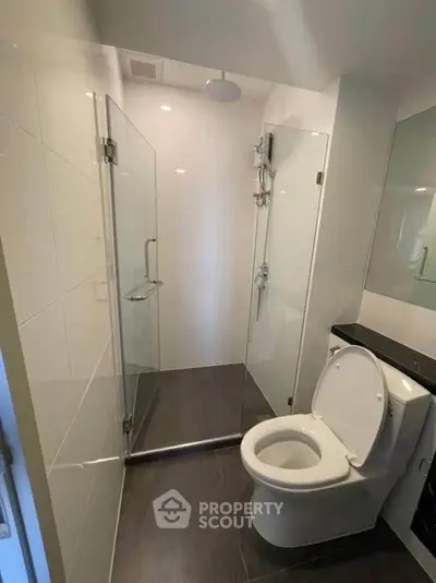 Modern bathroom with glass shower and sleek design