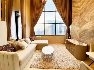 Luxurious high-rise living room with stunning city view and elegant decor