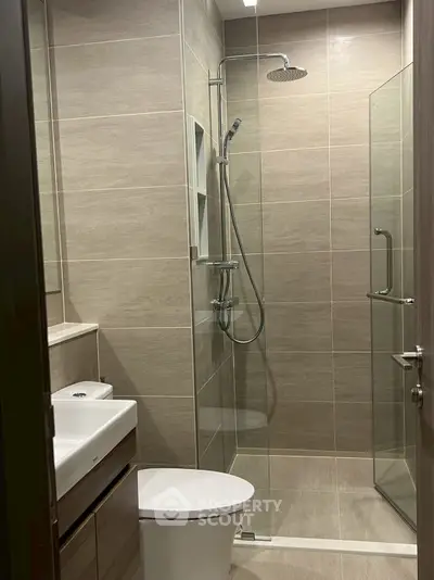 Modern bathroom with sleek shower and contemporary fixtures