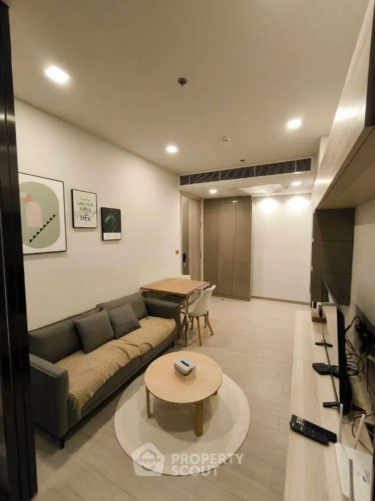 Modern living room with stylish decor and cozy ambiance, perfect for urban living.