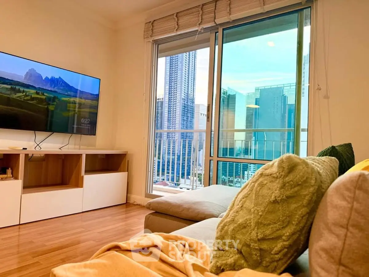 Modern living room with city view and cozy seating area