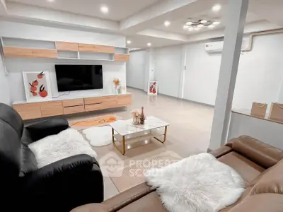 Spacious modern living room with sleek furniture and stylish decor